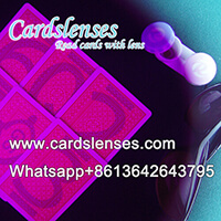 marked playing cards with contact lenses and glasses